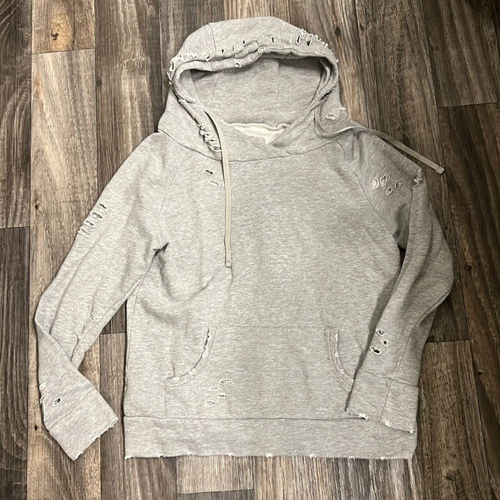 Light a grey distressed sweatshirt